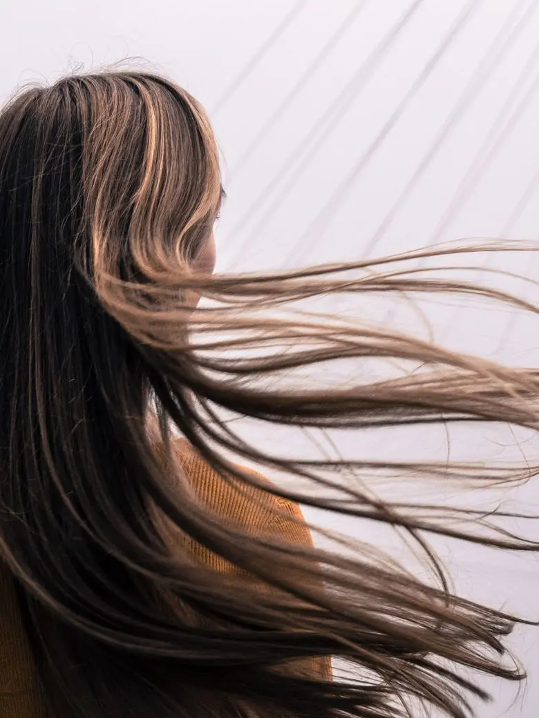 Long glossy brunette Remy human hair extensions — LUSSÉ Dubai